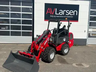 Brugt HZM 809 med ny skovl og pallegafler.