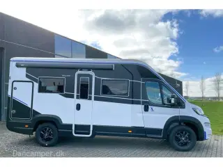 2024 - Chausson X650 Exclusive line   Unik cross-over model! Camper med stor Lounge og siddegruppe, sænkeseng, stor garage, Artic-, Connect-, Tilbehørs- og Safetypakke,