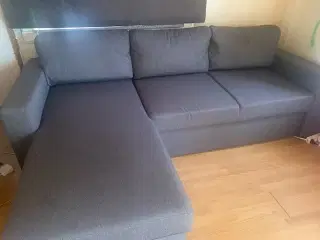 Sofa med chaiselong i mørkegråt stof