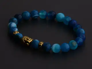 Armbånd m.lille forgyldt buddahhoved/ blå lavasten