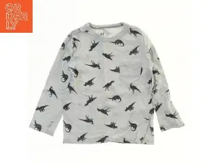 Langærmet bluse med dinosaurprint fra H&M (str. 98)