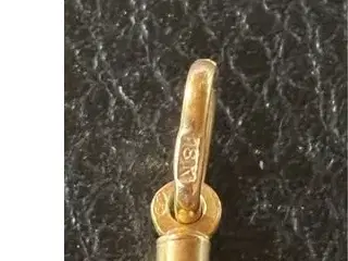 3 18 karat guld vedhæng.læs texten