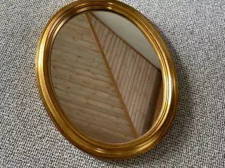 Ovalt guld spejl