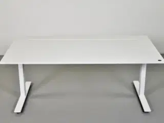 Hæve-/sænkebord med hvid plade og hvidt stel, 160 cm.