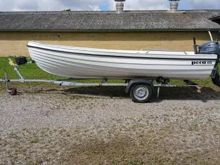Poca 475, velholdt båd, med trailer, med ny motor.
