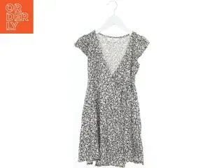 Blomsterkjole med dyb v-hals fra H&M (str. 140)