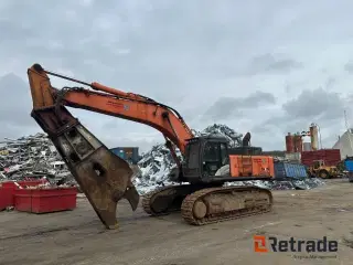 Hitachi med jern saks