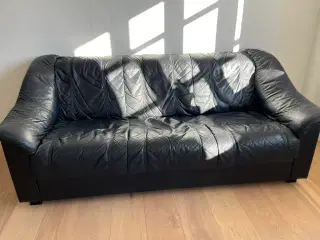 Gratis sofa i sort skind