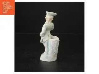 Porcelænsfigur af mand i historisk dragt