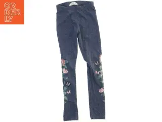 Blå leggings med blomsterprint fra H&M (str. 122)