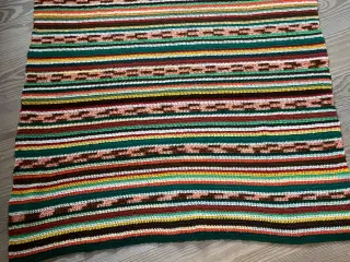 Hæklet tæppe i uldgarn