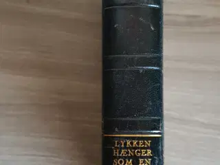 Lykken hænger som en Drueklase