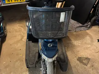 Blå el scooter 