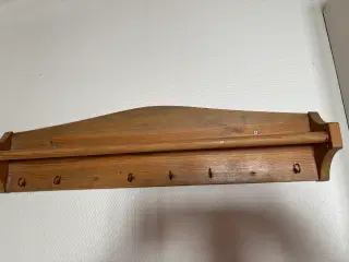 Afsyret viskestykke holder