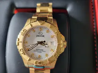 Jaguar ur guld 34 mm