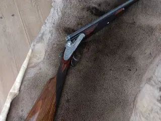 Flot caliber 20, med engelsk skæfte og sidelås 