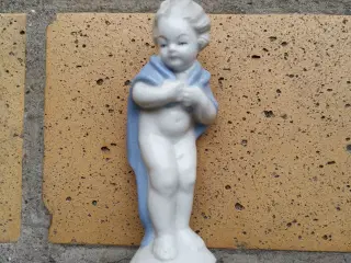 Figur af en lille pige der har været i bad