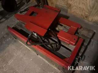 Kassevender med støttearm