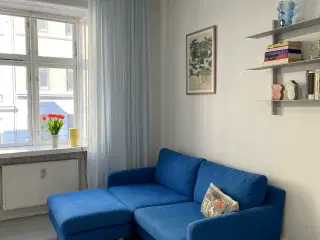 Skøn blå Sofacompany sofa med puf