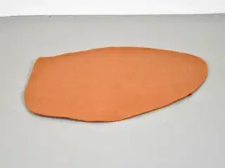 Fraster pebble gulvtæppe i orange filt