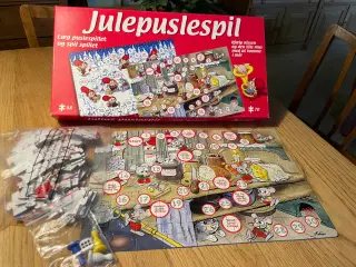 Julepuslespil - hjælp nissen med at komme i mål