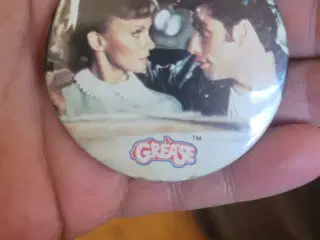 Grease badge