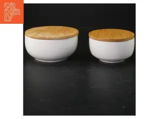 Sæt af to opbevaringsskåle med trælåg fra Anna & Clara (str. Ø. 10,5 cm. og. ø. 13 cm)