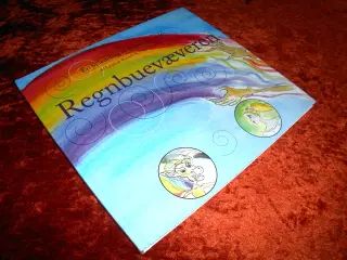Regnbuevæveren, Lyndsay Russell,