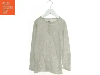 Langærmet trøje med knapper fra H&M (str. 128)