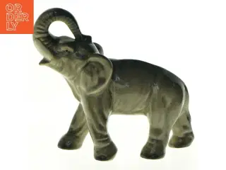 Elefant med løftet snabel i porcelæn (str. 17 x 15 cm)