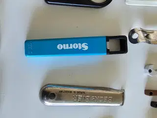 32 Oplukker