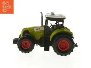 Lille grøn legetøjstraktor (str. 15x8,5 cm)