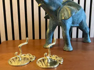 2 Messing knager med patina.