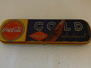 Coca-Cola metal penalhus