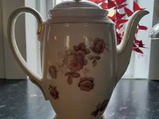 Kande med brun blomst