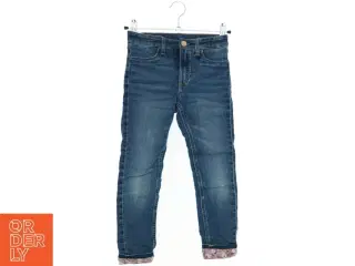 Skinnyfit lined jeans med blomstrede opslag fra H&M (str. 116)