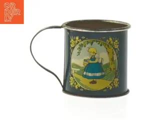 Samlermøntkrus med Irmapige motiv fra Irma (str. Ø. 4 cm. længde. 4 cm)