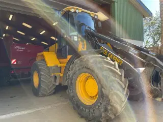 JCB 426 med traktor dækmontering og hurtigskifte samt centralsmørring