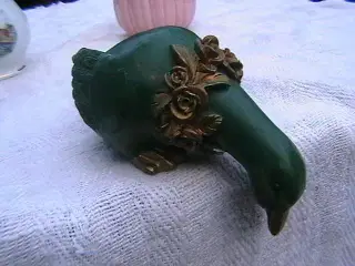3  små figurer. 