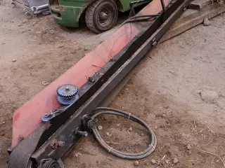 Hydraulisk transport bånd