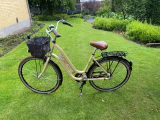 Fin dame cykel i reto udseende 