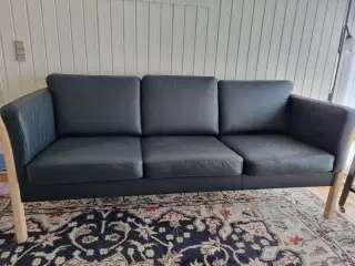Sofa i sort bonded læder