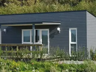 Nye feriehuse ved Limfjorden nær Aalborg - Opvarmet minivandland, legeplads, cafe, gratis WIFi, åbent hele året, i hjertet af Nordjylland.