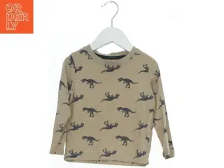 Langærmet bluse med dinosaur print fra H&M (str. 92)