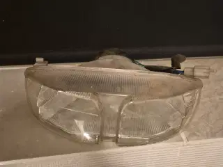 Forlygte sym jet 