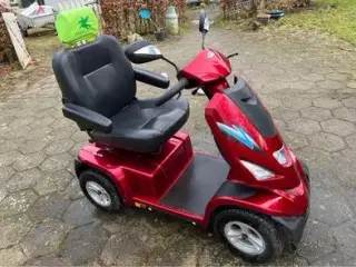 El køretøj / handicapscooter