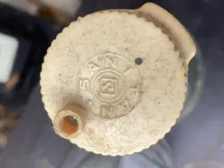 Gamle mælkeflasker med låg 