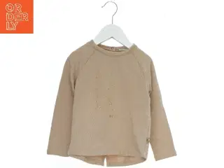 Langærmet bluse med gyldent tryk fra Pomp de Lux (str. 98)