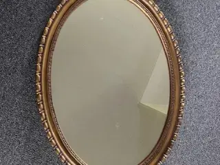 Spejl     Måler  76/56 cm  med ophæng til begge si