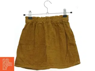 Brun fløjl nederdel med knapper fra H&M (str. 98)